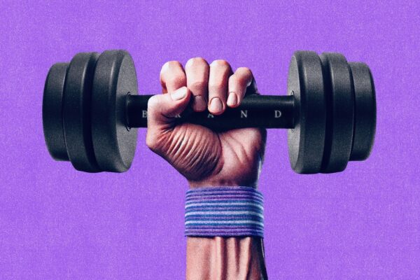 A hand rising from the bottom of the image holds a weight inscribed with the word 'brand,' symbolizing the effort of lifting and strengthening a brand, in line with influencer marketing’s role in brand lift and advocacy.