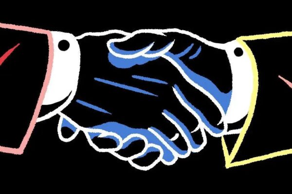 A business partnership concept illustrated by two hands in suits shaking hands, representing how publishers can build strategic vendor partnerships to drive meaningful performance.
