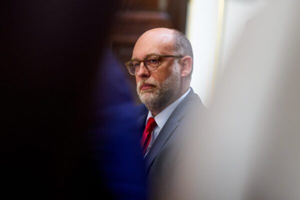 Russell Vought, director of the Office of Management and Budget (OMB), sits in a cabinet meeting.
