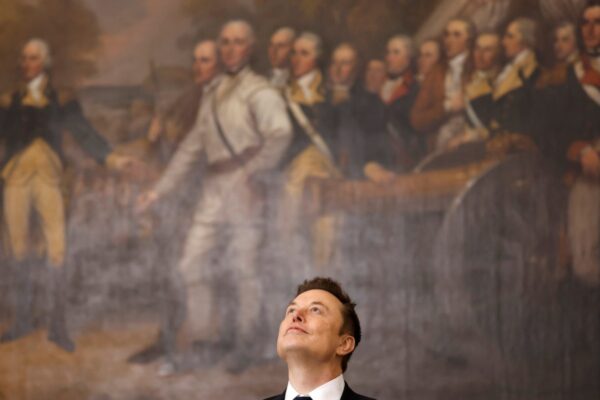 a photo of Elon Musk looking up at the ceiling while standing in front of a historical painting